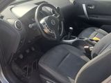 the interior of a car with the door open and the driver ' s seat down