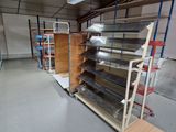 a rack with a lot of shelves on it in a warehouse