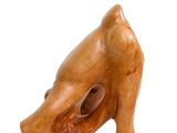 an image of a wooden sculpture of a dog ' s head on a white background