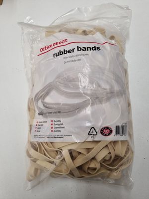 a bag of rubber bands sitting on a table