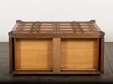 an old wooden chest sitting on top of a hard wood floor