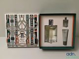 une image représentant une boîte contenant un flacon de parfum