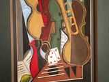 a picture of a painting of a musical instrument on a table