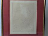 framed drawing of a man sitting on a bench in a red frame