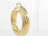 gold plated hoop earrings on clear acrylic stand