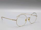 glasses on a white surface with a white background