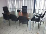 a table and chairs in a room with a sliding glass door