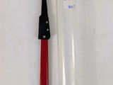 a toothbrush and a tube of toothpaste next to each other