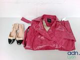 two pairs of shoes and a pink purse on a table