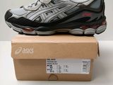 asics gel - kayano running shoe in a box on top of a cardboard box