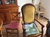 two chairs and a table in a living room