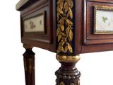 a wooden table with a clock on top of it