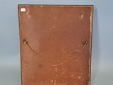 a brown box with a smile drawn on it