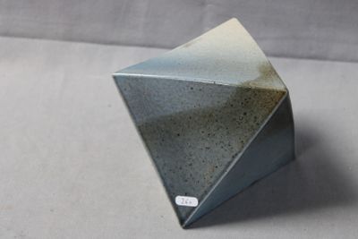 a small gray object that is sitting on a table