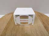 a white box that is sitting on a wooden table
