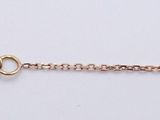 a close up of a chain with five rings on it