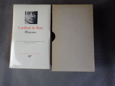 un livre ouvert sur lequel figure le portrait d'un homme