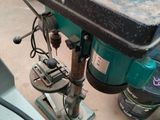 a machine that is sitting on a table in a garage