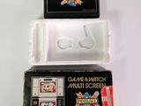 deux jeux Nintendo dans une boîte posée sur une table