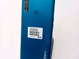 an image of a close up of the back of a blue phone