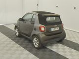 an image of a small car parked in a garage