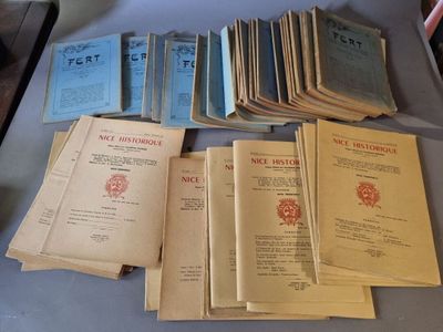a lot of old books on a table