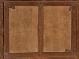 an old window with a wooden frame on the outside