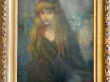 une peinture à l'huile représentant une femme aux cheveux longs, dans un cadre doré