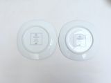 two plates that are sitting next to each other on a table