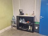 a blue door in the corner of a room