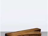 une image représentant un morceau de bois posé sur une table