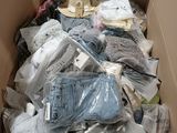 a box full of clothes and other items in it