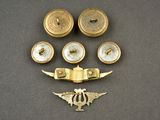 four different types of brass objects on a table