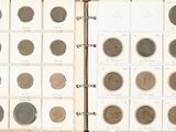 an open book with a bunch of different coins on it