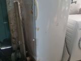 an image of a kitchen with a washing machine and dryer