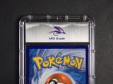 a close up of a pokemon card in a plastic case
