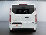 a white van that is parked inside of a building