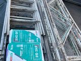 a pile of boxes and crates sitting on the ground