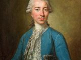 portrait of a man in a blue jacket and white lace