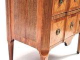 a marble top chest of drawers with a marble top