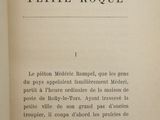 an open book with a black and white image on it