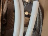 a box with a couple of hoses inside of it