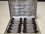 a bunch of chocolate bears in a silver case