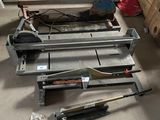 a lot of tools that are sitting on the floor