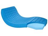 the blue plastic lounge chair is sitting on a white surface