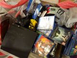 a bag full of video games and games on the table