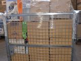 a metal cart with boxes on it in a warehouse
