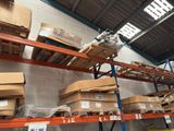 many boxes on the shelves in the warehouse