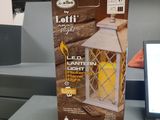 a box that is sitting on a table next to a laptop
