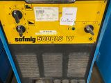 a close up of a machine with a hose on it